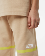 הַלבָּשָׁה GCDS מכנסי טרנינג להקת לוגו נמוכה בז' ילדים 0028751 - Image 4